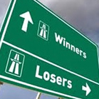 Winners and losers road sign