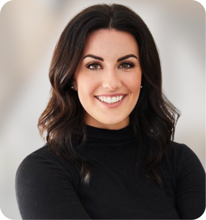 Portrait of a smiling brunette woman in a black turtleneck