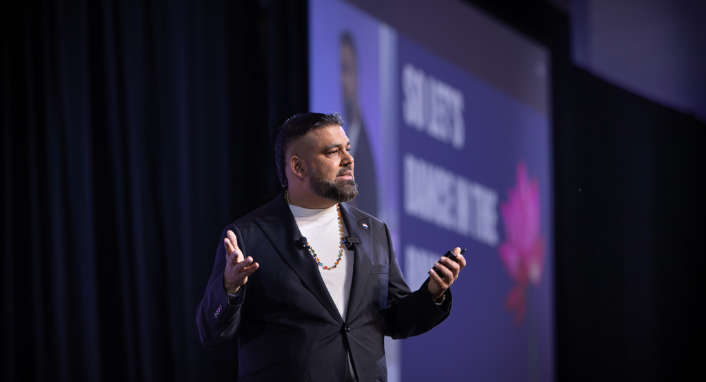 Richard Robbins presenting on stage